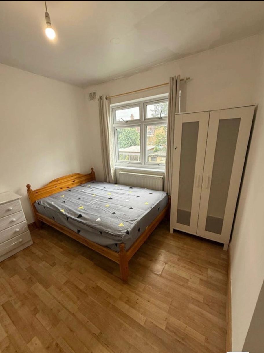Double bedroom with wardrobe and window over the garden
